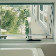 White frame open awning window