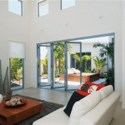 Bi-fold doors opening to an indoor garden area