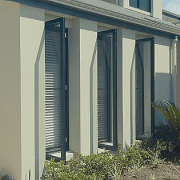 3 Casement Windows of a house with small garden