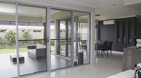 White frame sliding door in a house White frame sliding door in a house