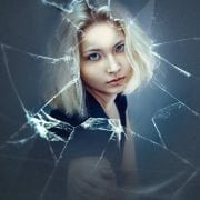 broken window, anxious woman