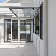 Beach House with Gas Strut Windows