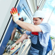 Men Installing Soundproof Double Glazed Windows
